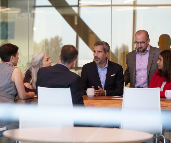 Employee discussion in cafe