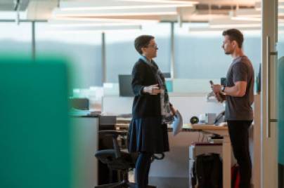 Co-workers talking