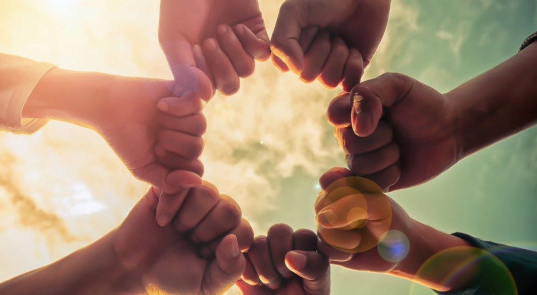 Hands holding planet Earth