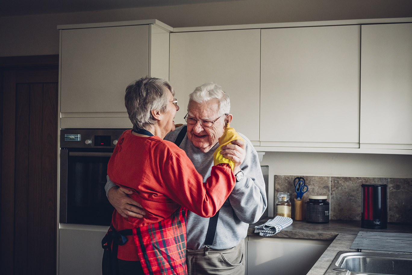 MSD Ireland Human Health - Stock photo of senior couple dancing in their kitchen
